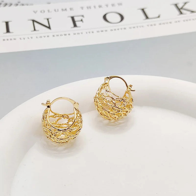 Brincos Ocos de Argola Tendência de Moda