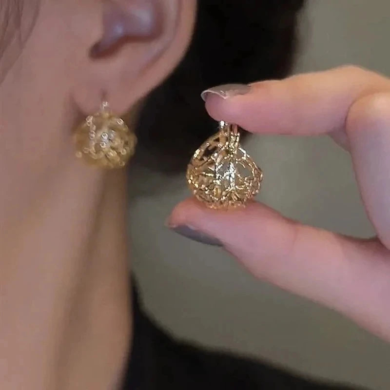 Brincos Ocos de Argola Tendência de Moda